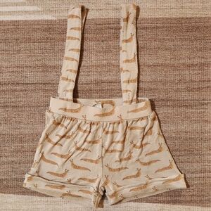 Kate Quinn banana slug suspender shorts